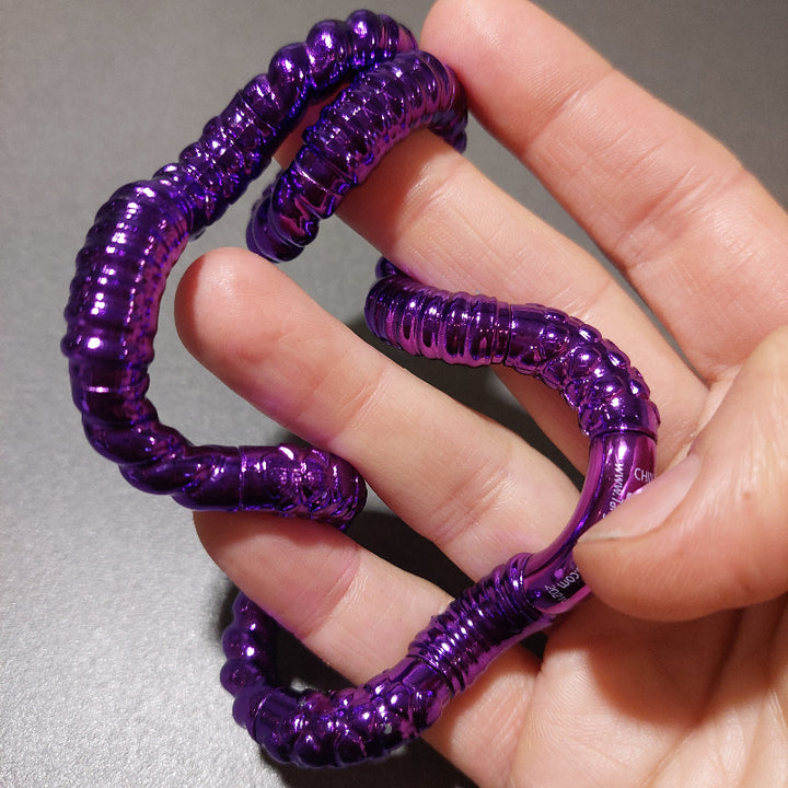 structuur tangle metallic paars in hand, fidget speelgoed