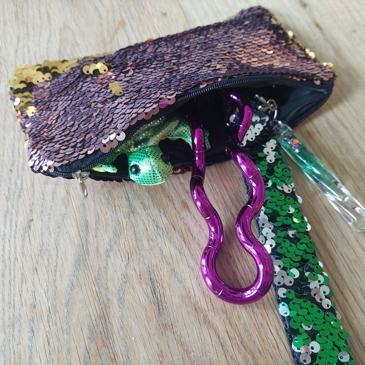 pailletten etui en armband, tangle, toverstaf steutelhanger en tangle in fidget etui, motoriekspeelgoed, sensoriekspeelgoed, autime