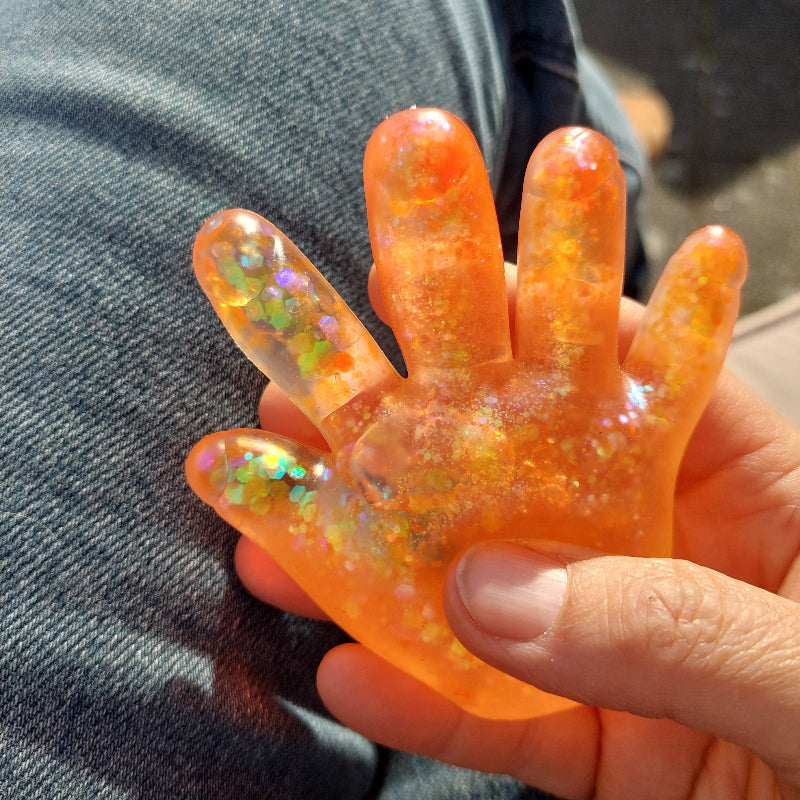 Sugar Squeeze hand, oranje fidget hand in hand, squishy