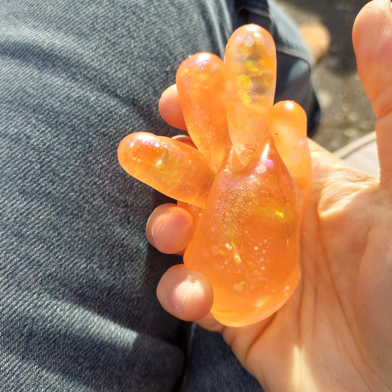 Sugar Squeeze hand fidget, gedrukt hand in hand