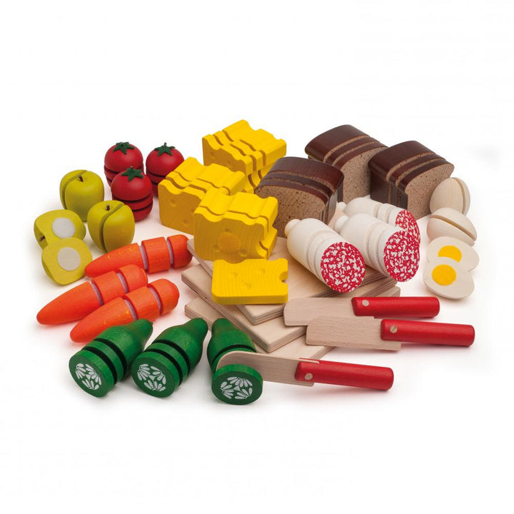 Set aus Schnittgrün, Obst und Brot