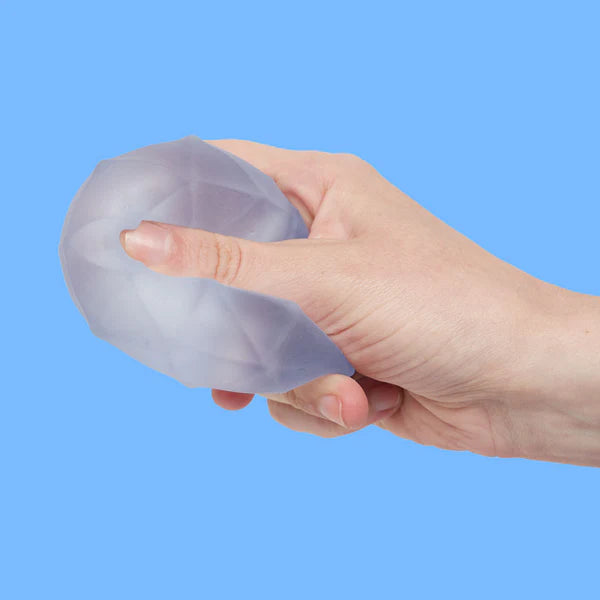 Hand die Speks Gump Surface Burst knijpt voor stressvermindering