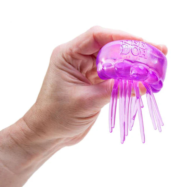 paarse needoh jelly squish gedrukt in hand, 