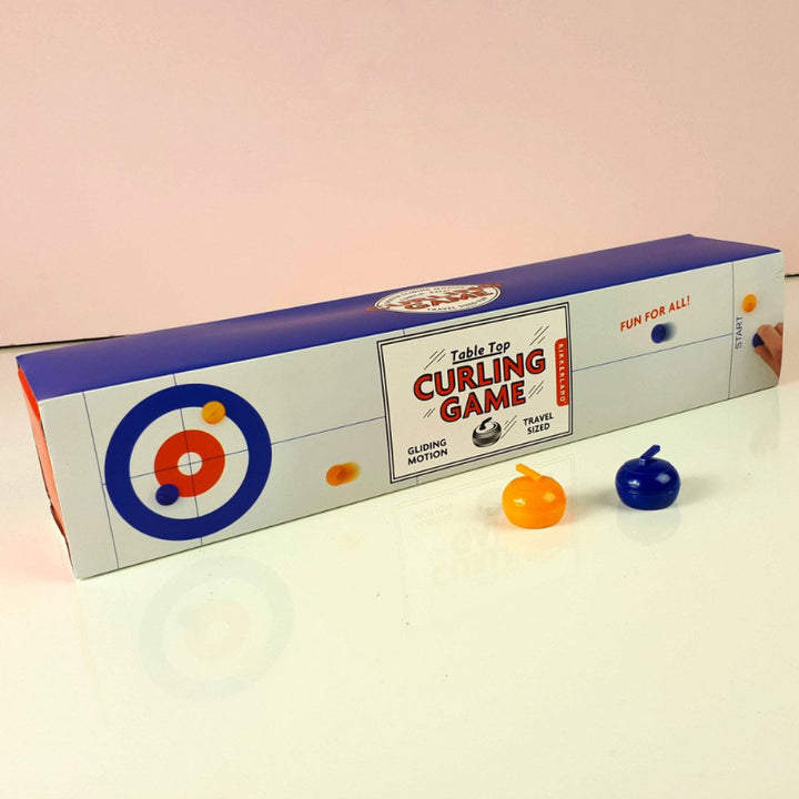 kikkerland Tafel curling, verpakking van table top curling game, gliding motion, travel sized