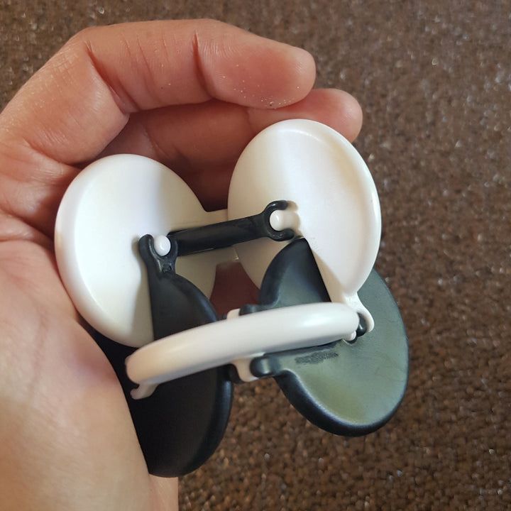 Tangle Friemel awesome OSM, zwart en wit in hand, gedraaid, draai fidget