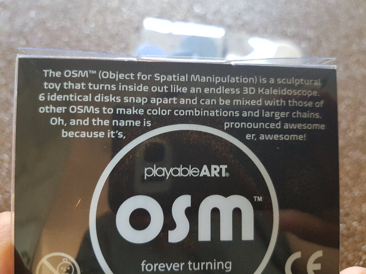 verpakking van de osm met uitleg, fidget, friemel