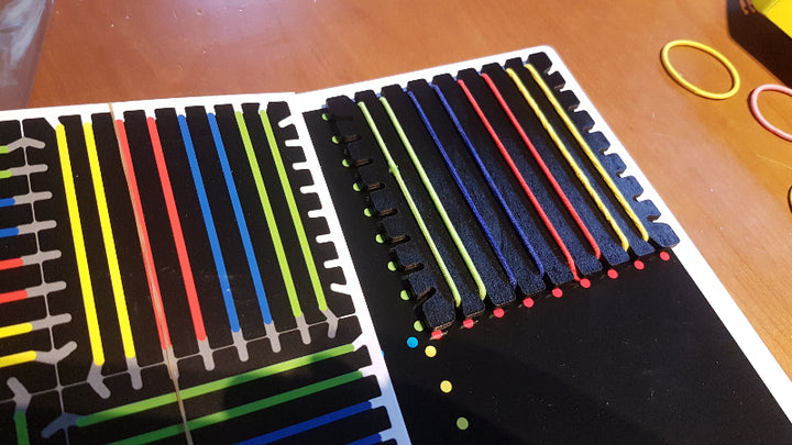 Jakobs Magna bands, fijn motoriek spel met elastiekjes
