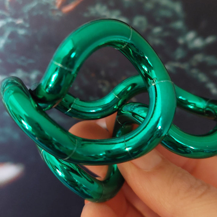 Tangle Metallic tangle groen in hand