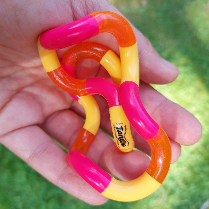 Tangle Tangle oranje-geel-rood, fidget, fijne motoriek, autisme speelgoed