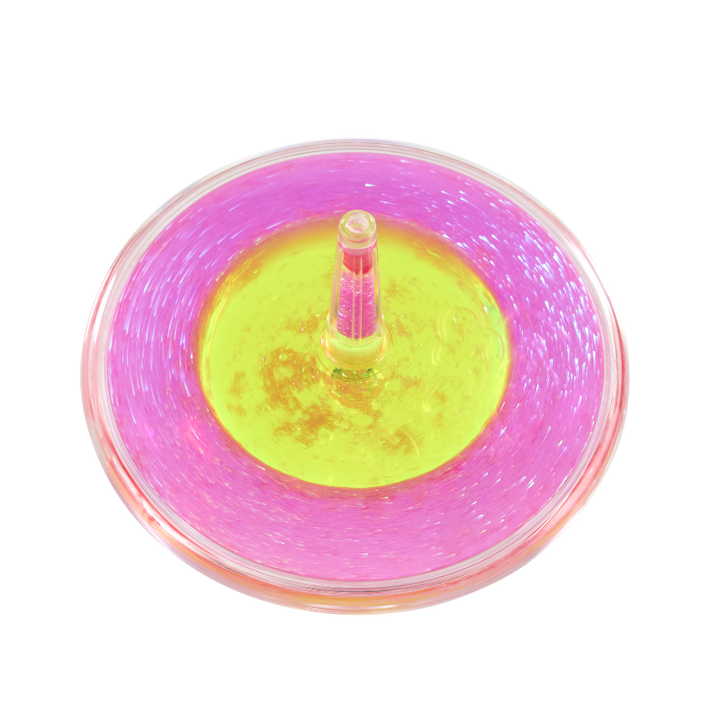 lava tol roze-geel, tollende tol met twee kleuren effect door olie 